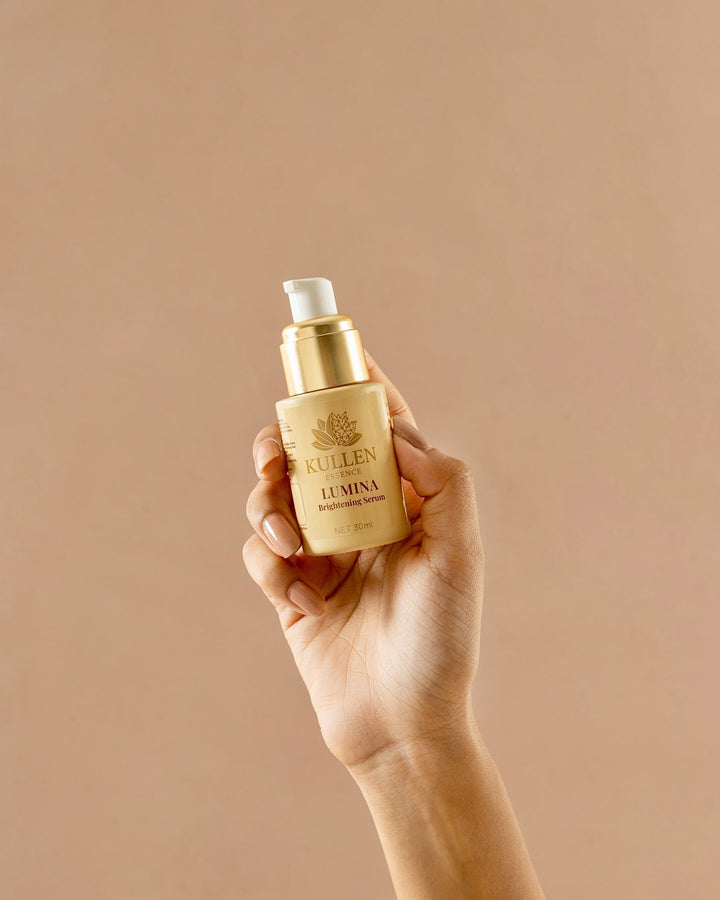 Lumina Brightening Serum with Vitamin C & Hyaluronic Acid | 30ml - Kullen Lifestyle/application shot: Applying Kullen Lumina Brightening Serum for glowing, hydrated skin